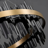 Design-Pendelleuchte in Ringform in Schwarz-Gold für das Wohnzimmer
