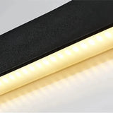 Lange LED-Wandleuchte über einem Sideboard im Wohnzimmer