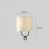 Beige Vintage-Wandleuchte mit Stoffschirm für das Schlafzimmer