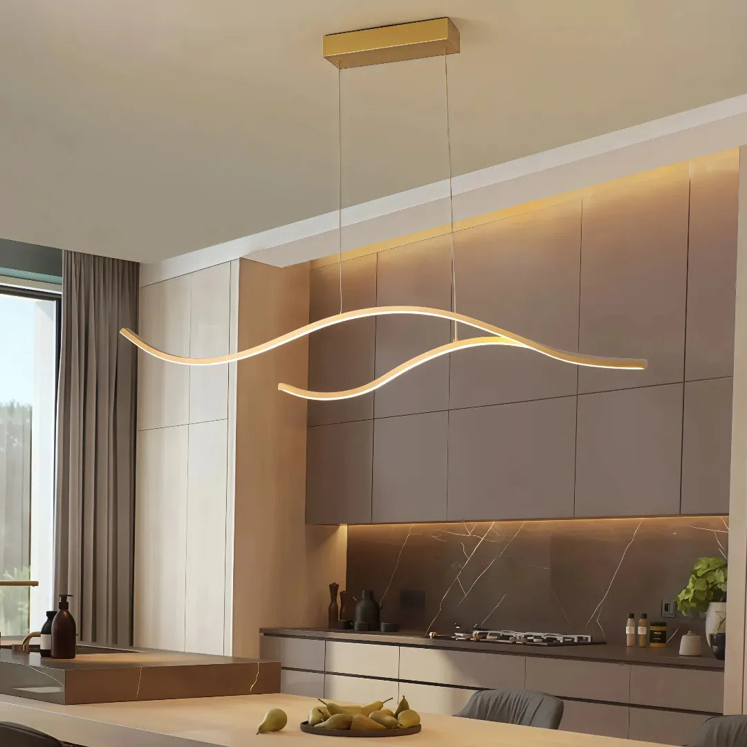 Goldene einflammige LED-Pendelleuchte in Wellenform