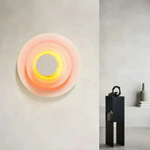 Moderne LED-Wandleuchte in Blumenform – rund & flach, aus Metall