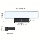 Moderne LED Außenwandleuchte mit Bewegungsmelder in Schwarz, IP65, 40–60 cm