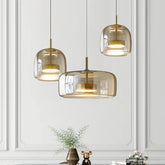 Moderne LED Pendelleuchte aus amber Glas für Esszimmer