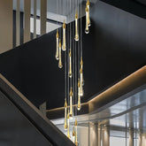 Moderne mehrflammige LED Pendelleuchte Gold mit Kristall für Treppenhaus
