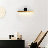 Moderne lange Wandleuchte in Schwarz-Gold für den Innenbereich
