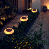 Runde Garten-Solarleuchte mit Erdspieß und RGB-Farbwechsel