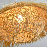 Boho Hängelampe aus Rattan in Hutform für den Esstisch