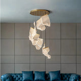 Moderner langer Kronleuchter in Gold fürs Wohnzimmer