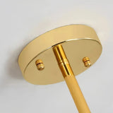 Goldener Leuchtenkörper mit radialen Armen und weißen Glasschirmen