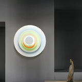 Moderne LED-Wandleuchte in Blumenform – rund & flach, aus Metall