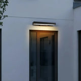 Moderne LED Außenwandleuchte mit Bewegungsmelder in Schwarz, IP65, 40–60 cm