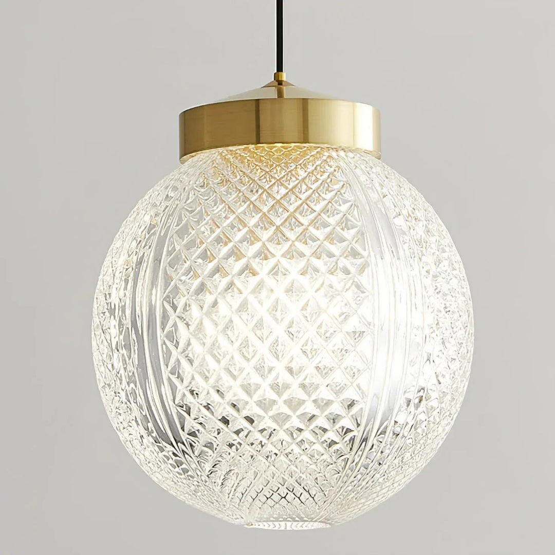 Einflammige Glas-Pendelleuchte mit goldfarbener Deckenrosette