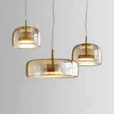 Moderne LED Pendelleuchte aus amber Glas für Esszimmer